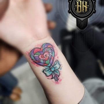 Water Color Wrist Lolipop Tattoo